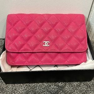 Pink wallet on a chain